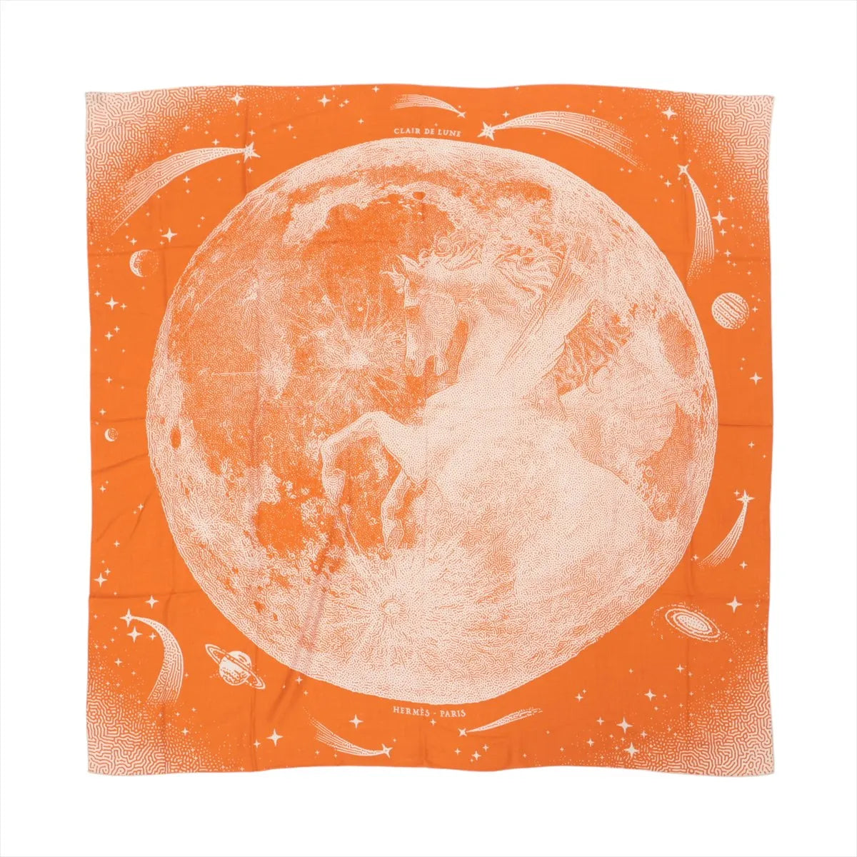 Orange Hermès “Clair de Lune” Carré 140 scarf with a large moon illustration, stars, comets, and planets, featuring “CLAIR DE LUNE” and “HERMÈS PARIS” text.