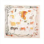 Beige Hermès Carré 100 cashmere-silk scarf laid flat with illustrated horses, orange and gray accents, and a striped border on a white background.