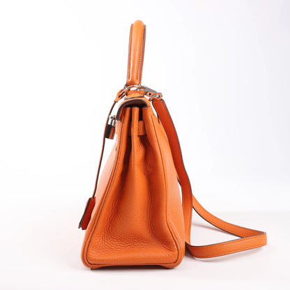 HERMÈS Kelly 28 Le Tournay Taurillon Clemence Handbag in Orange Silver Metal Fittings □H: 2004