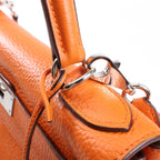 HERMÈS Kelly 28 Le Tournay Taurillon Clemence Handbag in Orange Silver Metal Fittings □H: 2004