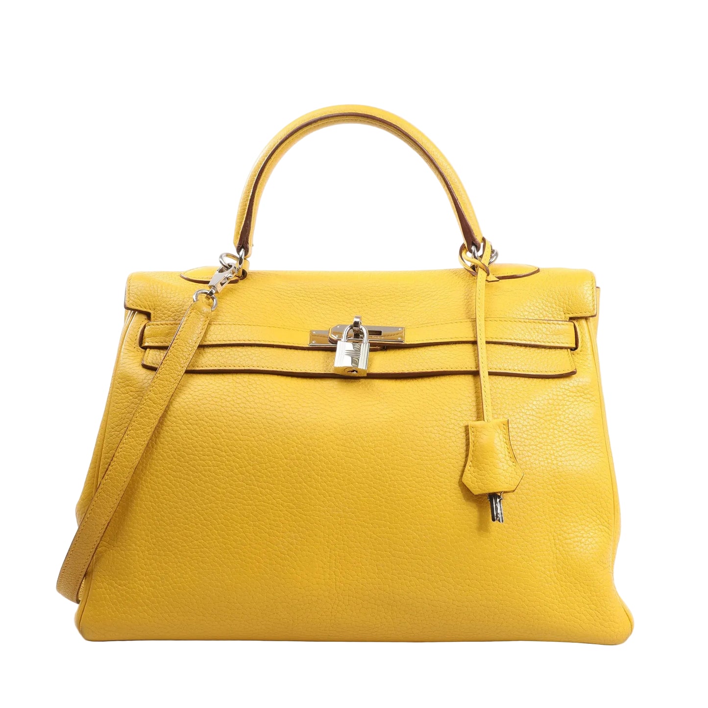 Hermès Kelly 35 handbag in Soleil yellow Taurillon Clemence leather, featuring a top handle, detachable shoulder strap, palladium hardware, signature flap closure with padlock and key, and structured silhouette.