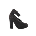 Black suede platform heel with wide ankle strap buckle and tall block heel on white background