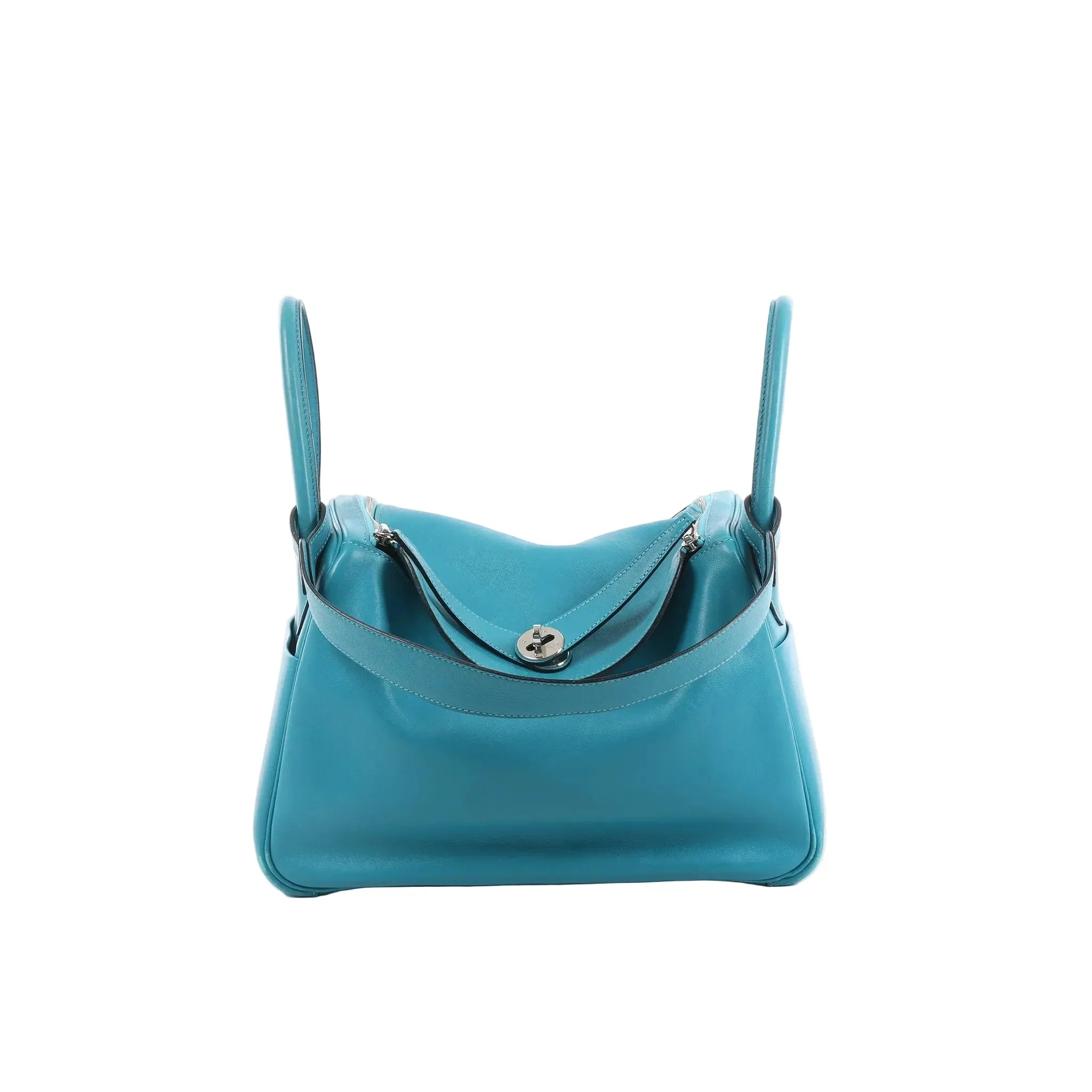 Hermès Lindy 30 handbag in turquoise leather with two top handles, silver-tone turn-lock hardware, and zip-top compartments on a white background.
