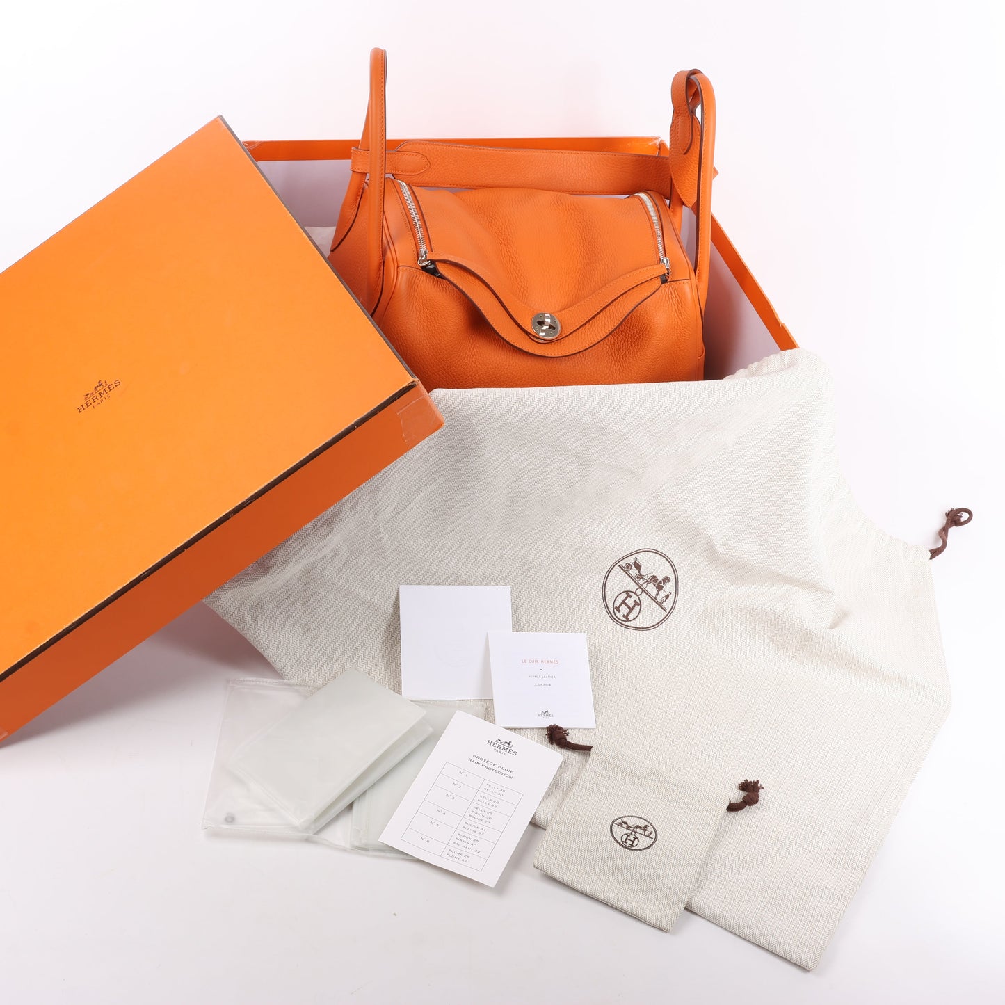 Sac à main Hermès Lindy 34 Taurillon Clémence Orange, garnitures en métal argenté □P:2012