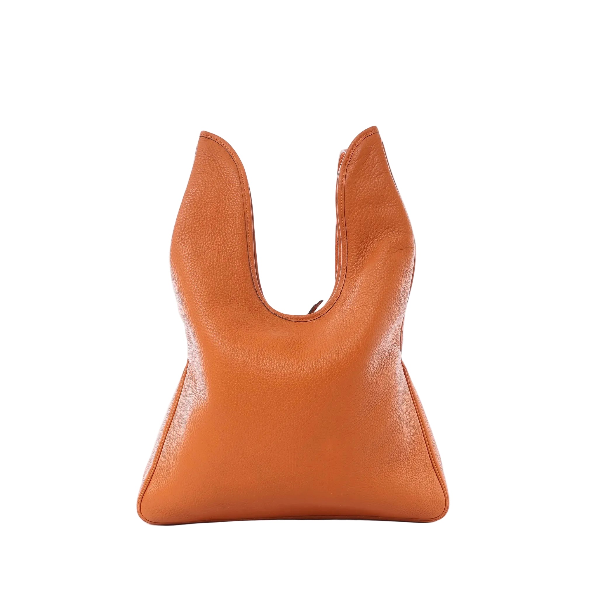 Hermès Massai PM shoulder bag in orange pebbled leather with curved cutout handle silhouette on white background.