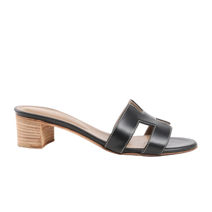 Hermès Oasis black leather sandals with H cut-out design and stacked heel, size 36.5 EU.