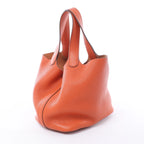 HERMES Picotin Lock 18 PM Taurillon Clemence Handbag in Orange X: 2016