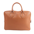 HERMÈS Plume 40 handbag in gold Evercolor leather with double top handles, white contrast stitching, and silver-tone hardware, shown upright against a white background.