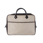 Hermès Plume Dog 38 bag in beige Toile H canvas with dark brown leather trim and top handles, zip-top design on white background.
