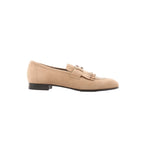 Beige Hermès Royal suede loafer with fringe detail and H metal hardware, shown in side profile on a white background.