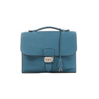 Blue Hermès Sac à Dépêches 27 pebbled leather bag with single top handle, front flap, hanging clochette and silver-tone clasp hardware.
