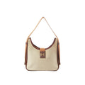 Front view of Hermès Sako shoulder bag in beige Toile H canvas with brown leather trim, long tan strap, and front leather tab with gold-tone H detail.