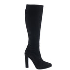 Hermès black suede knee-high boot with rounded toe, platform sole and high block heel on a white background.