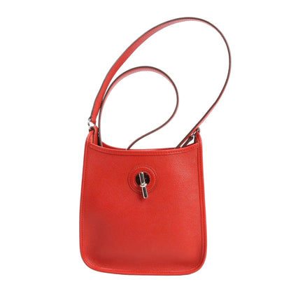 Hermès Vespa TPM shoulder bag in bright Rouge Vif Epsom leather with silver-tone toggle closure and slim leather strap.