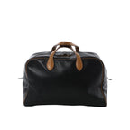 Hermès Victoria 43 black leather handbag with natural tan leather handles and top zip closure on white background
