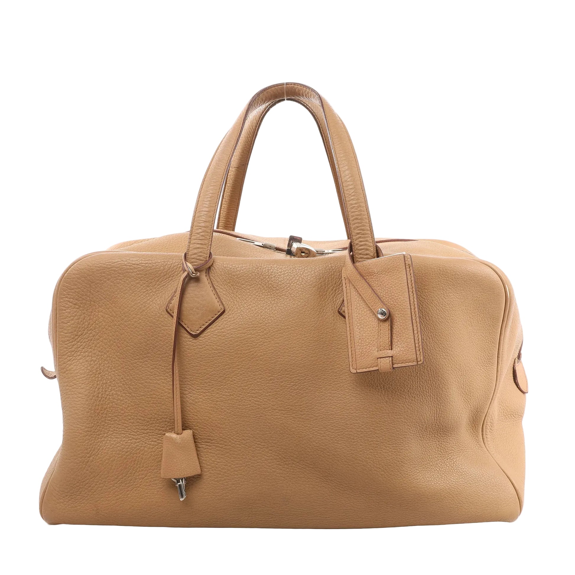 HERMÈS Victoria 43 handbag in brown Taurillon Clemence leather featuring double top handles, leather clochette with lock and key, and structured travel-ready silhouette.