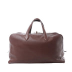 Hermès Victoria 50 travel bag in brown Taurillon Clemence leather with rolled top handles, soft structured silhouette and zip-top closure.