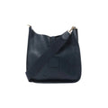Hermès Evelyne I 33 GM in dark navy leather with perforated H logo and wide shoulder strap with gold-tone clip, shown on white background