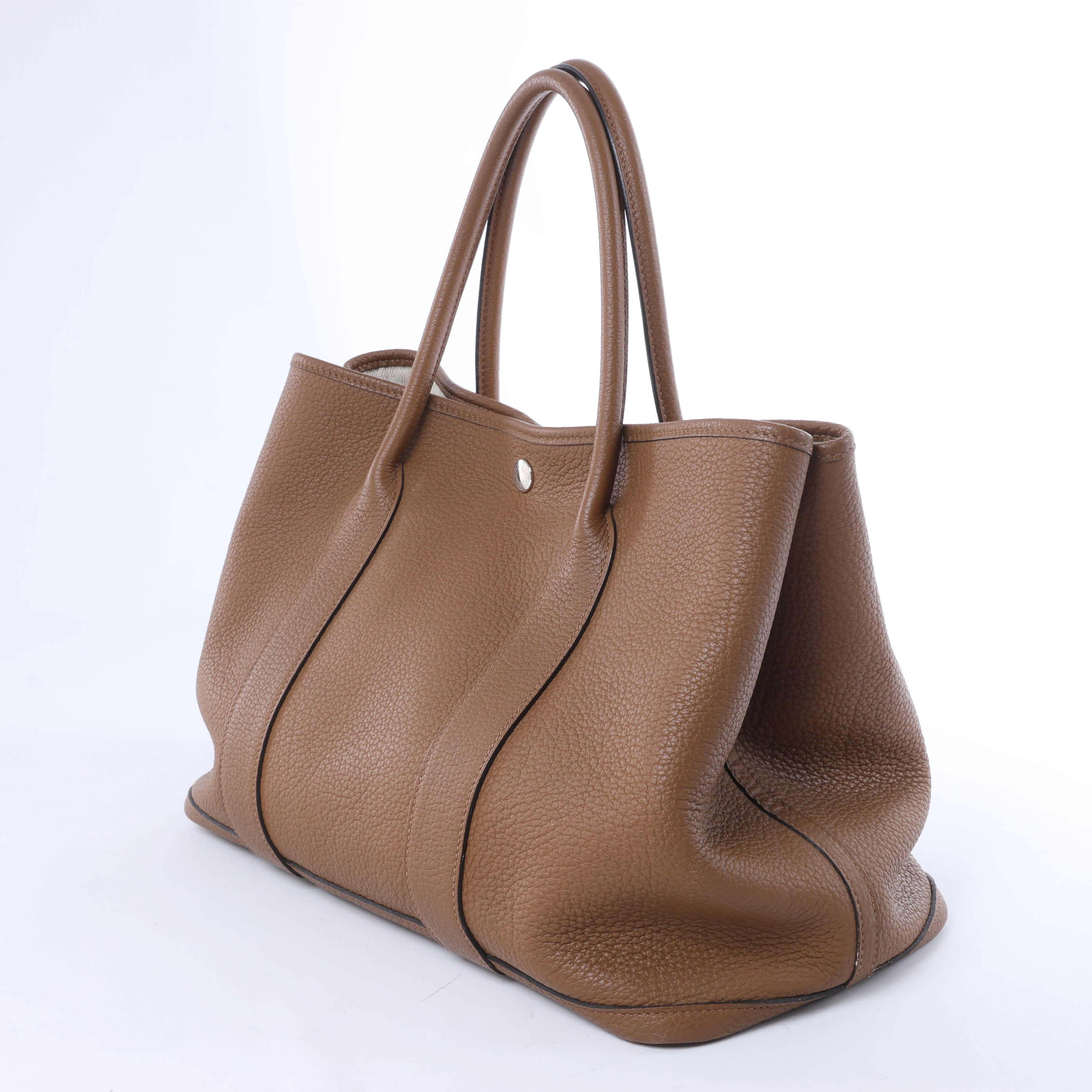 Bolso de mano HERMES 24/24 29 Togo de piel con detalles metálicos negros y dorados D: 2019