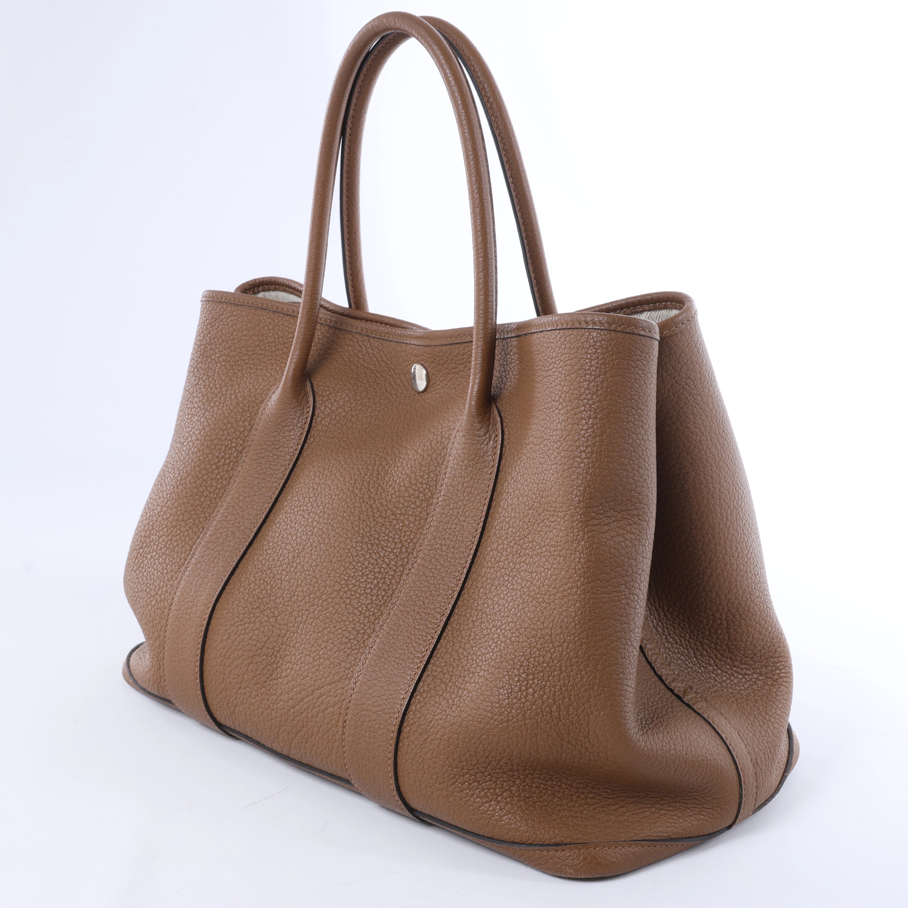 Bolso de mano HERMES 24/24 29 Togo de piel con detalles metálicos negros y dorados D: 2019