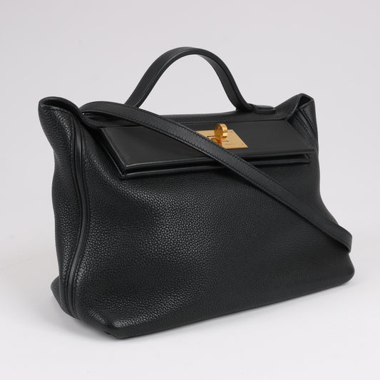 Sac à main HERMES 24/24 29 Togo en cuir noir et garnitures métalliques dorées D: 2019
