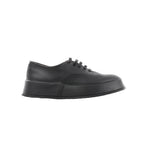 Black Jil Sander leather lace-up sneaker with smooth upper, tonal laces, and thick platform-style rubber sole, shown in side profile.