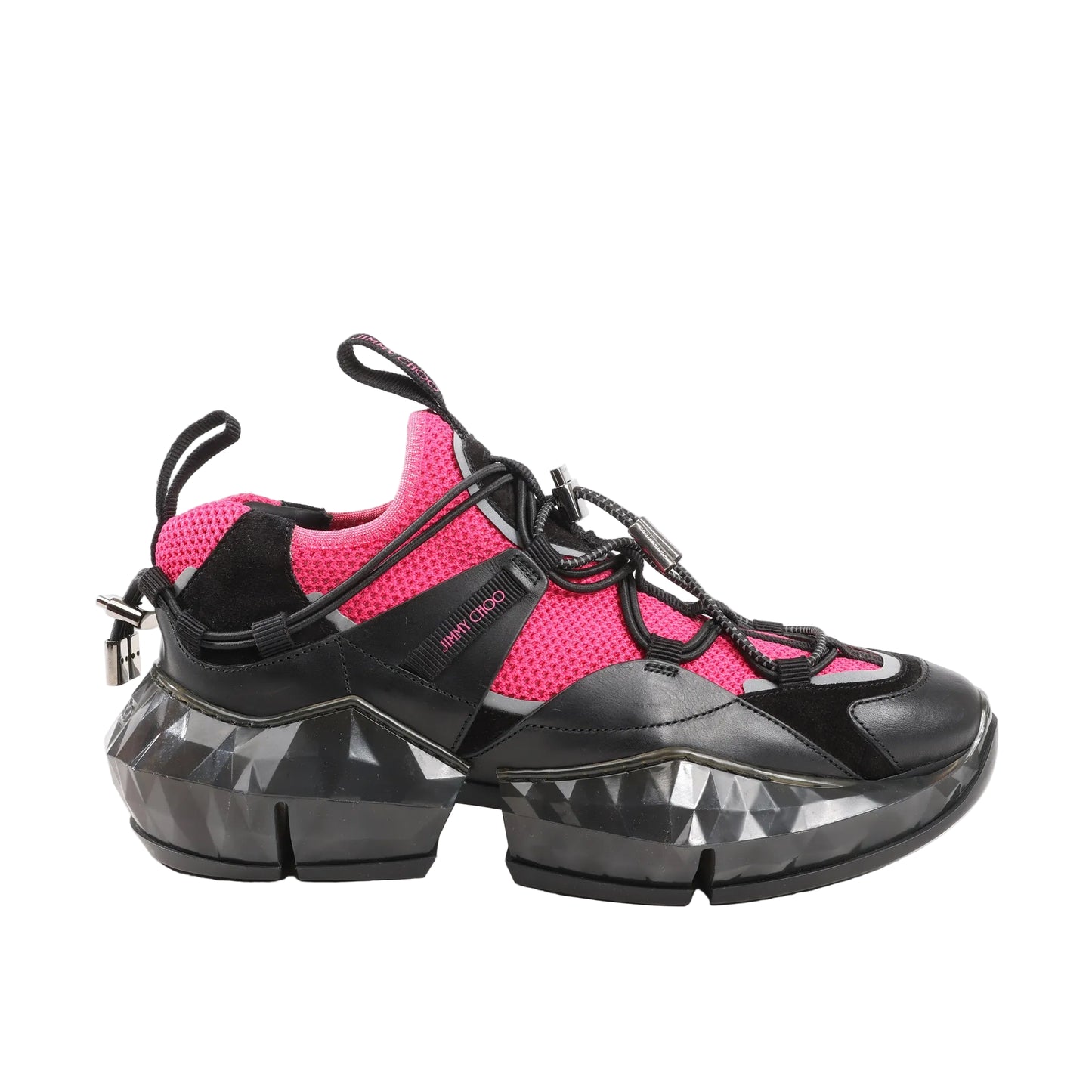 Jimmy Choo Diamond sneakers in vibrant pink mesh and black leather with geometric diamond-cut rubber soles, toggle laces, and logo detail, side profile view.