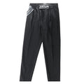 Just Cavalli black pinstripe trousers with branded “JUST CAVALLI” waistband detail, laid flat on white background.