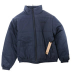 Navy blue Ksubi Sott puffer jacket with high padded collar, zip front, side pockets, elastic hem and cuffs, tonal chest logo, and hanging tag on white background.