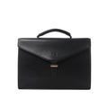 Black Loewe leather business handbag with structured rectangular shape, top handle, envelope-style flap, embossed Anagram logo and metal clasp.