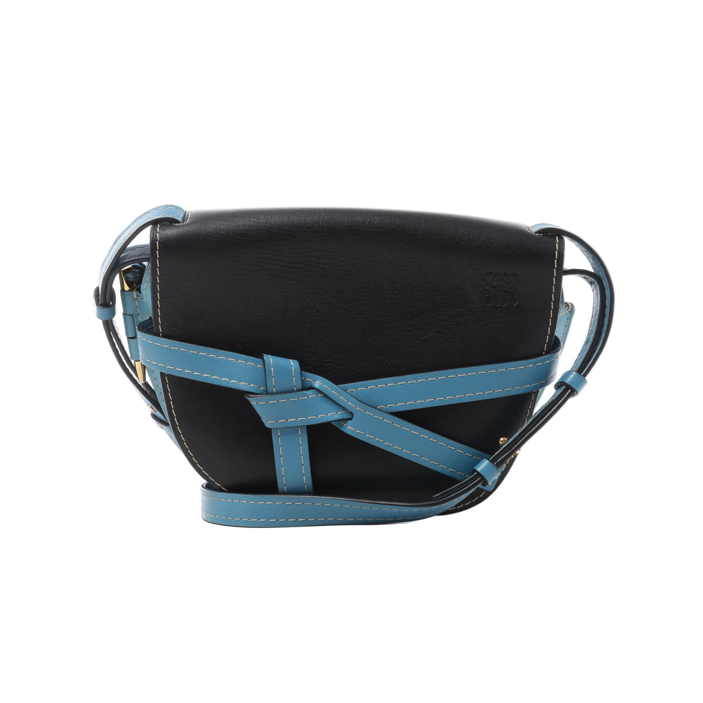 Black LOEWE Gate leather crossbody bag with blue leather straps, contrast stitching, knotted front detail and embossed Anagram logo.