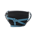 Black LOEWE Gate leather crossbody bag with blue leather straps, contrast stitching, knotted front detail and embossed Anagram logo.