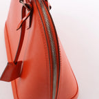 Louis Vuitton Alma PM Epi Leather Handbag in Orange