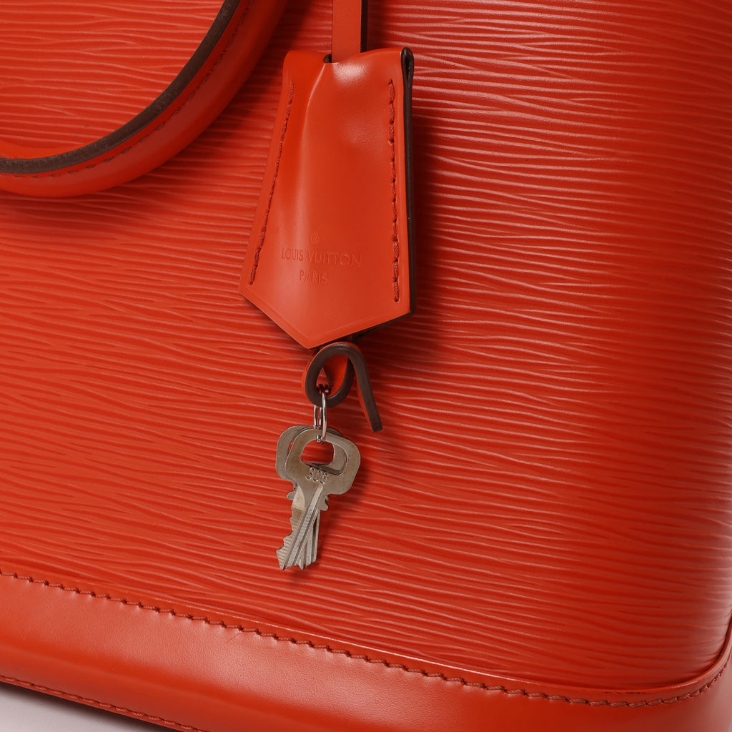 Louis Vuitton Alma PM Epi Leather Handbag in Orange