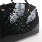 Bolso de mano Louis Vuitton Alma PM Epi de piel marrón