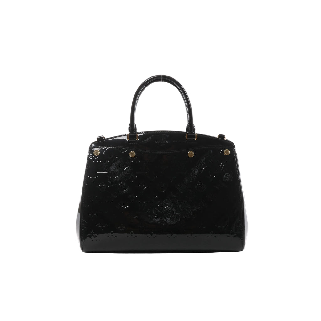 Black Louis Vuitton Brea MM handbag in glossy embossed Monogram Vernis leather with structured top handles and gold-tone hardware.