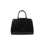Black Louis Vuitton Brea MM handbag in glossy embossed Monogram Vernis leather with structured top handles and gold-tone hardware.