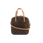 Louis Vuitton Spontini brown Monogram canvas handbag with natural leather top handles, shoulder strap and gold-tone hardware.