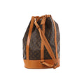 Brown Louis Vuitton Randonnée GM Monogram canvas backpack with tan leather trim, drawstring top and adjustable shoulder straps.