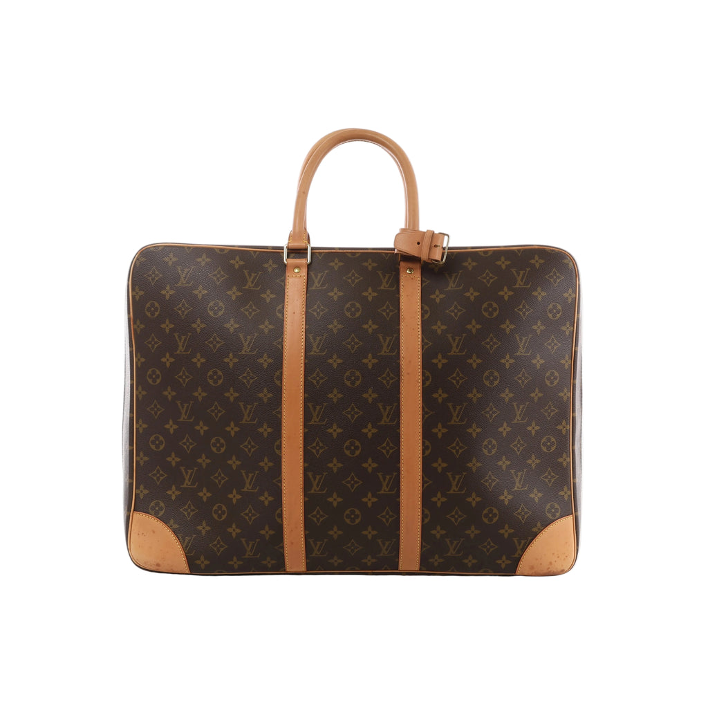 Brown Louis Vuitton Sirius 55 Monogram canvas travel bag with natural leather handles, vertical trim and reinforced leather corners.