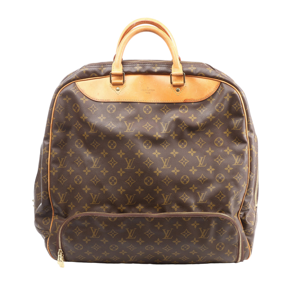 Brown Louis Vuitton Evasion Monogram canvas travel bag with natural leather top handles, piping and a large front zip pocket.