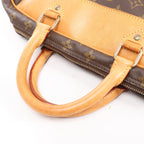 Louis Vuitton Evasion Monogram Travel Bag in Brown