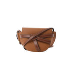 Brown Loewe Gate Small crossbody bag in grained leather with front knotted strap detail and adjustable shoulder strap