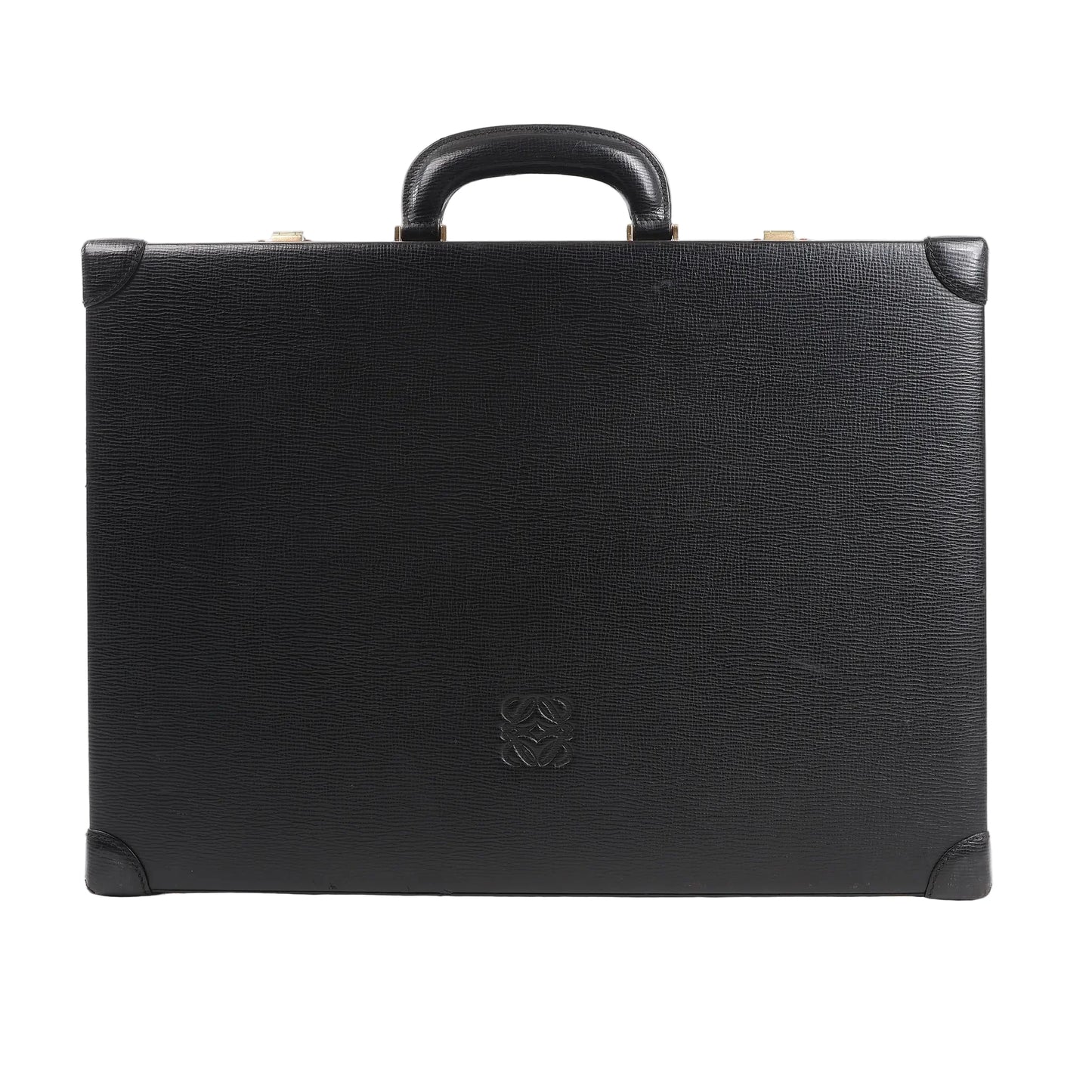 Loewe Anagram travel bag in black textured leather featuring a structured rectangular silhouette, top handle, reinforced leather corners, and embossed Anagram logo at the center, displayed against a white background.