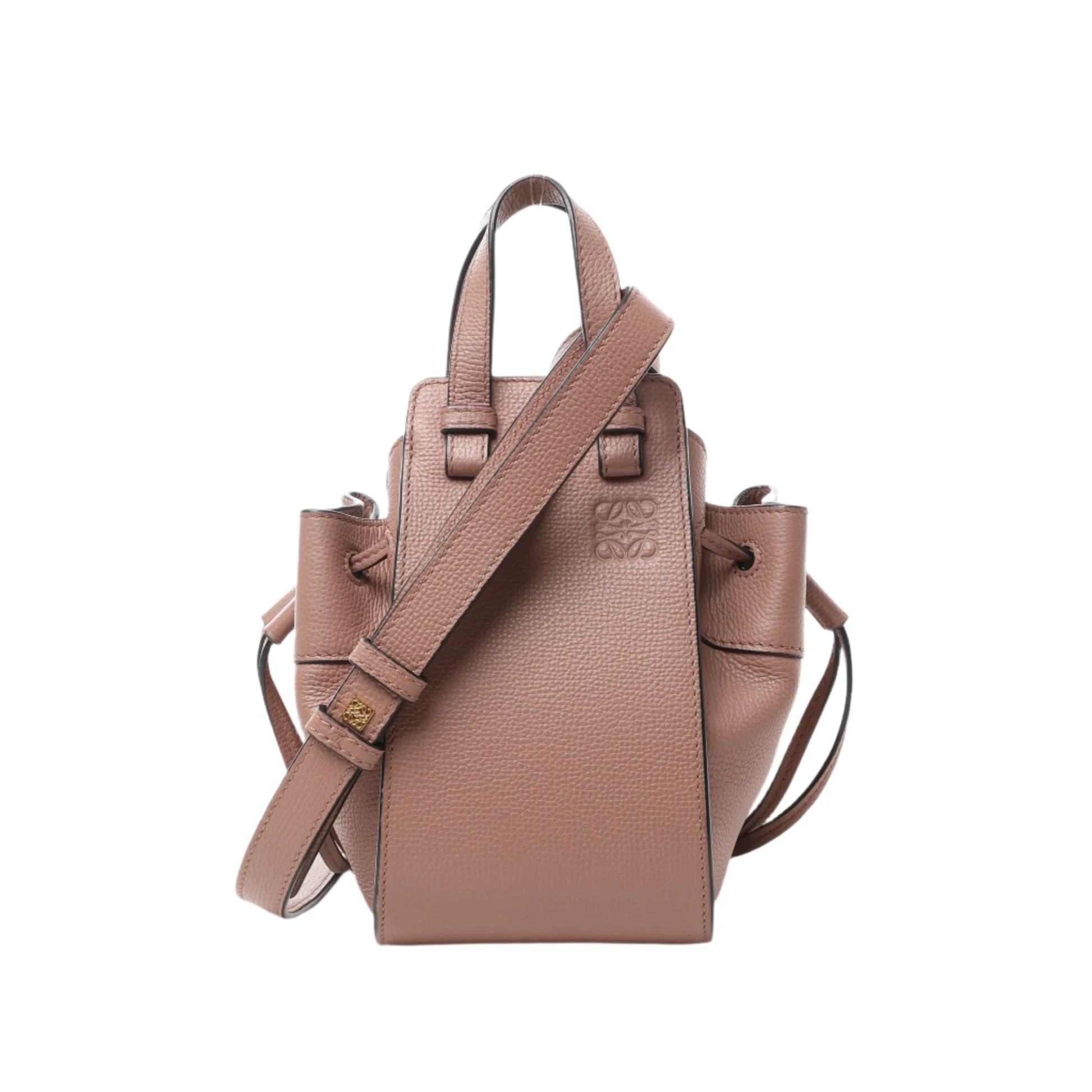 Front view of LOEWE Hammock Mini Leather 2Way Handbag in dusty pink grained leather with top handles, adjustable shoulder strap, and expandable drawstring sides, displayed against a white background.