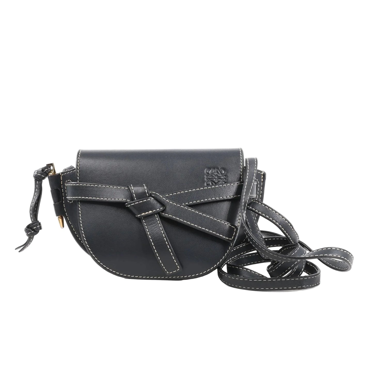 LOEWE Gate Mini Crossbody Bag in navy blue leather with white contrast stitching, knotted belt detail on the front, flap closure, and long adjustable leather strap, displayed against a white background.