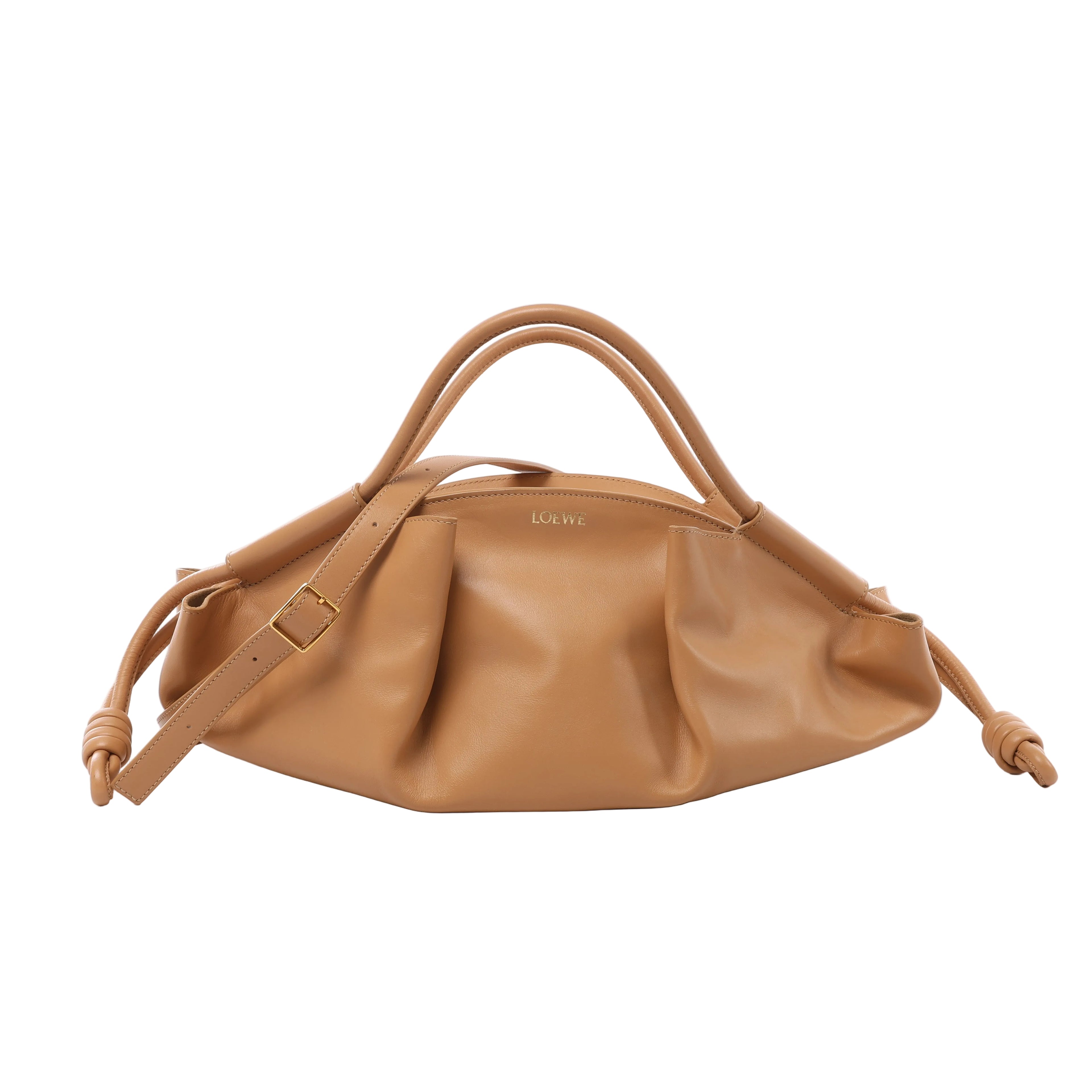Beige LOEWE Paseo leather handbag with curved top handles, adjustable shoulder strap, knotted side details and gold-tone buckle hardware.