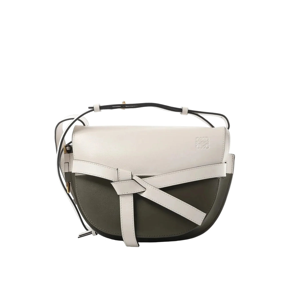 LOEWE Gate Small crossbody bag in white and olive green leather with front knotted belt detail and shoulder strap on a white background.