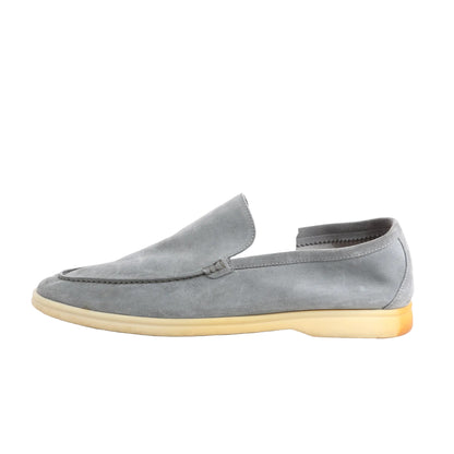 Loro Piana Casual Suede Moccasin Gull K66461 in gray, size 48 EU, featuring soft gray suede upper, stitched moc toe, and off-white rubber sole, displayed in profile against a white background.