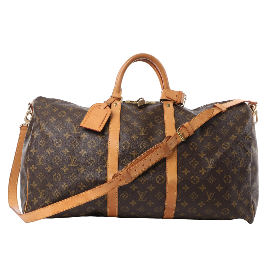Louis Vuitton Keepall Bandoulière 55 travel bag in brown Monogram canvas with natural leather trim, dual handles, adjustable shoulder strap, and gold-tone hardware.